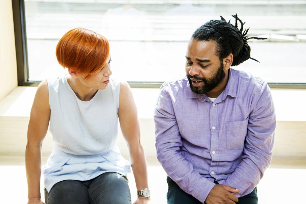 Multiracial couple talking