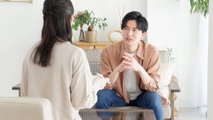 Asian man receiving psychological counseling